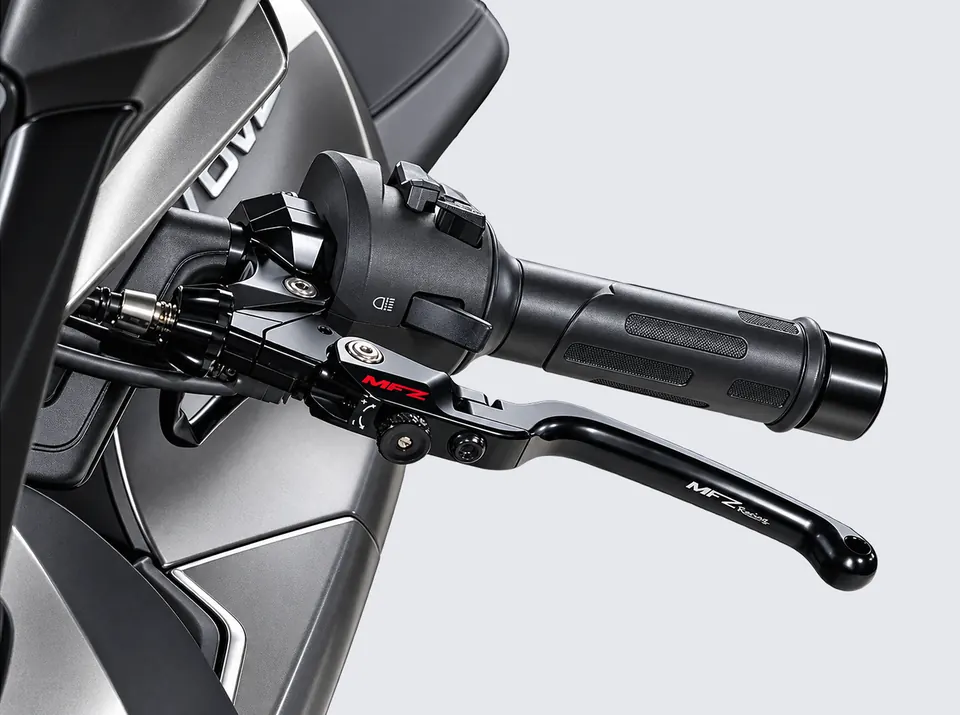 Adventure motorcycle with a forged front wheel